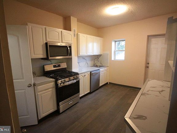 5th image of 2704 Greenmount Ave