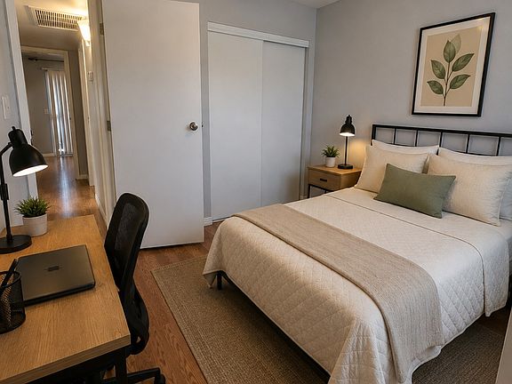 Upstairs 2nd bedroom with space for a desk or work area