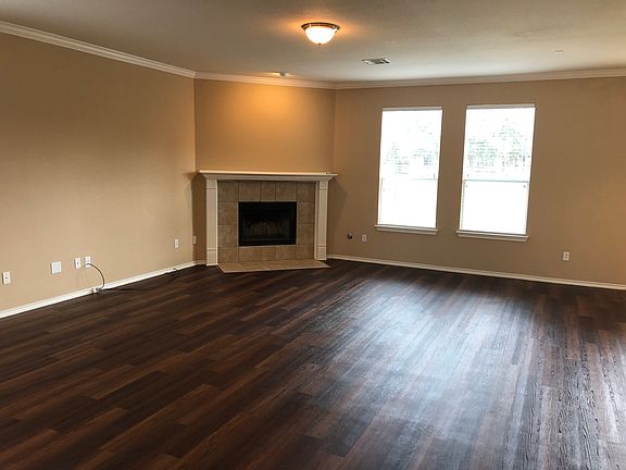 Living room with gas fireplace for cold, winter evenings.