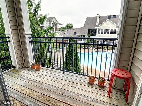 2nd floor balcony overlooking pool