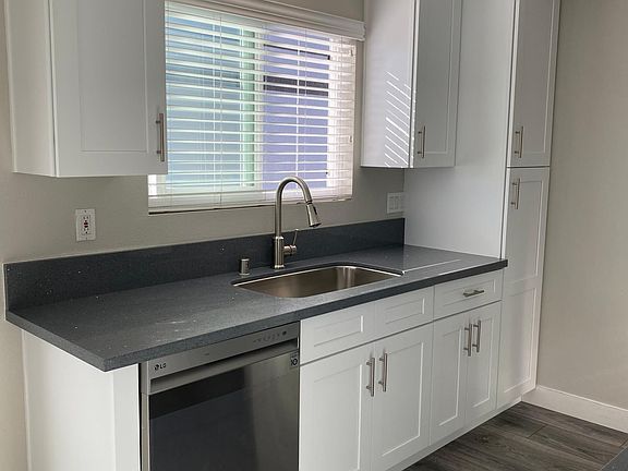 The unit features all new soft-close cabinetry throughout