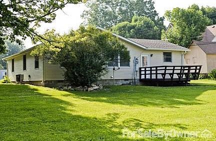 Back of the House
						:
						Here is an angled view of the house from the back yard.