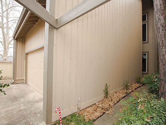 2 Car attached garage.  Sidewalk leads to a covered front porch.