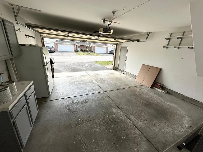 2 car garage w/ full size refrigerator.