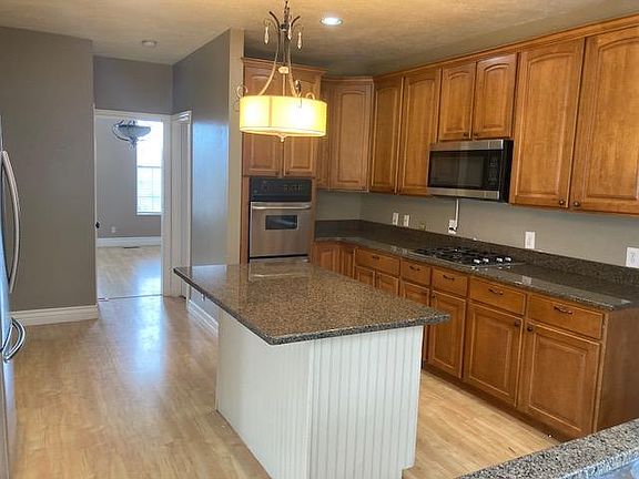 Expansive granite kitchen counters with island