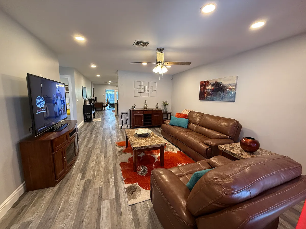 Photo 2 of 20 - 7106 NW 79th Ave #7106 - Tamarac, FL Living room, with 65 inch smart tv - 7106 NW 79th Ave #7106