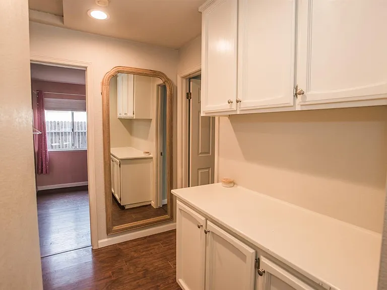 hallway with extra cabinets