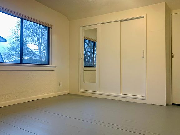Bedroom east facing with sunrise view. Two closets and storage access.