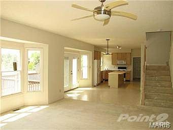 From fireplace through family room, breakfast room, kitchen