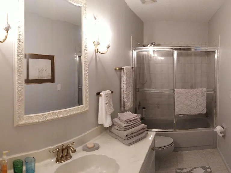 Private ensuite bathroom. Handheld shower