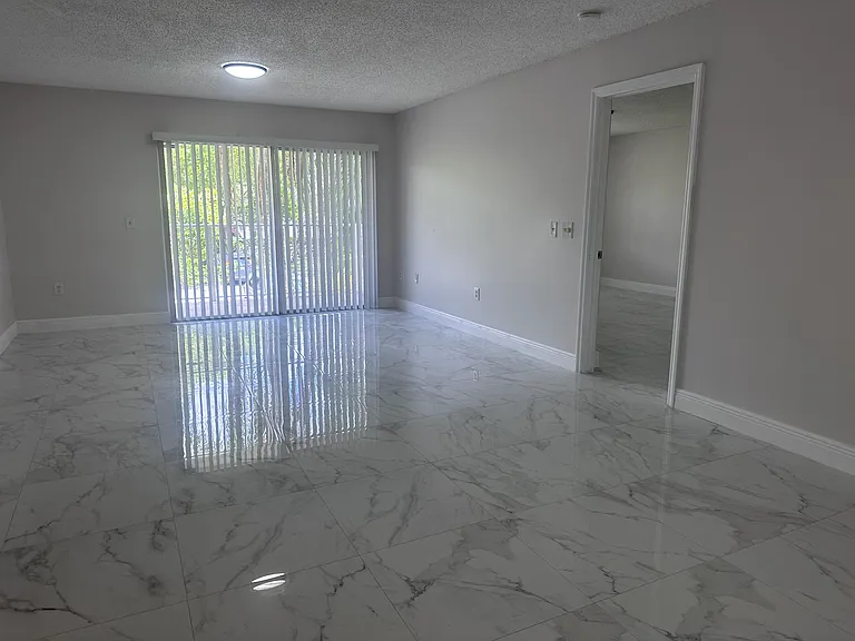 5011 Wiles Rd #207 — Photo 28