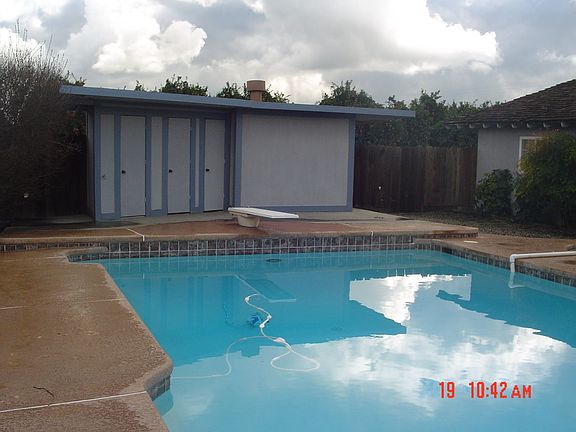 Large pool 40' x 20' x 11' deep end.  2 dressing rooms and half bath.