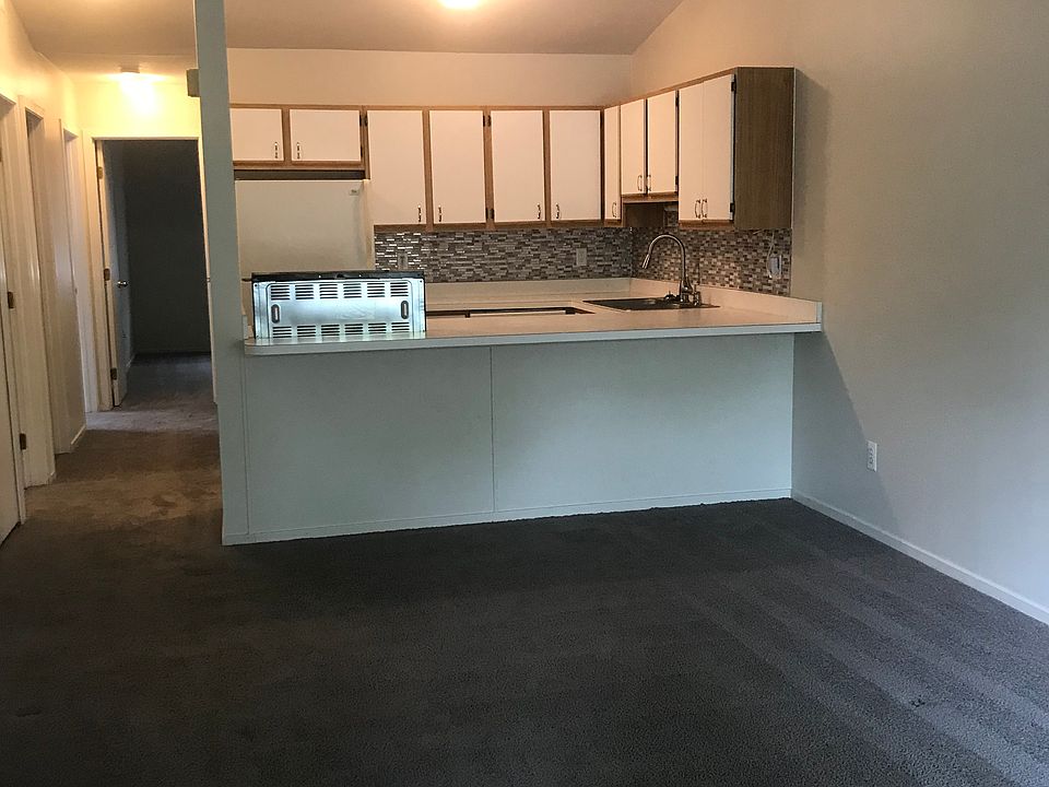 Kitchen cabinets have been painted and updated