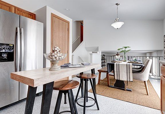 Large enough for your Island prep counter & stools, note the Brand New Amana Stainless Fridge!