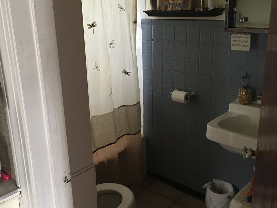 Bathroom with tub and shower.