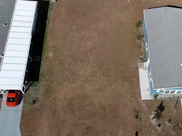 808 Lychee Dr, Barefoot Bay, FL 32976