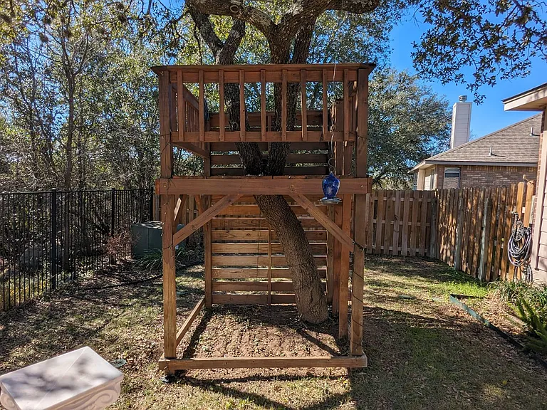 Treehouse with climbing wall