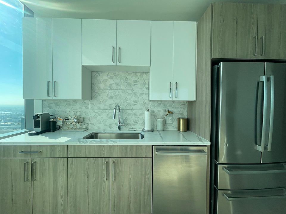 1st image of 40 E 9th St #118