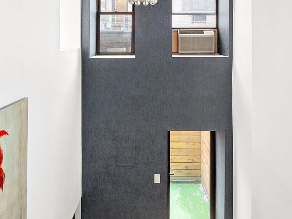 5th image of 23 E 10th St APT 1C