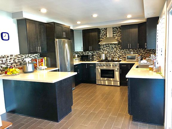 Kitchen with stainless steel appliances