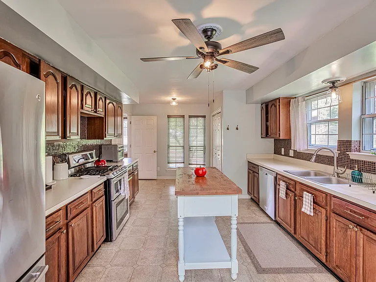 Large kitchen with stainless steel appliances, gas stove, and fully equipped with all kitchenware!!
