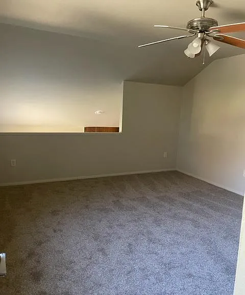 Second floor loft bedroom or office with closet.