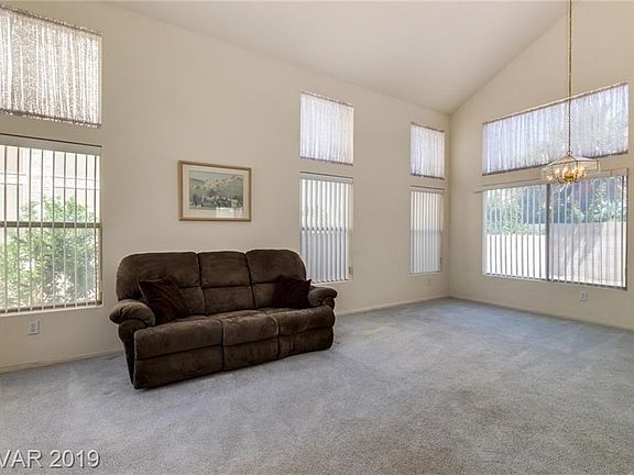 Living room has vaulted ceilings...