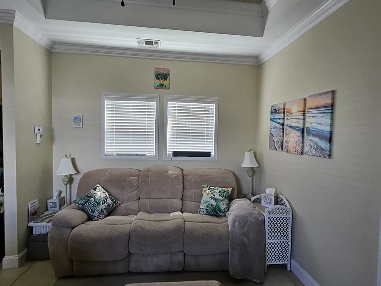VERY comfy couch that each side reclines, middle folds town for work space