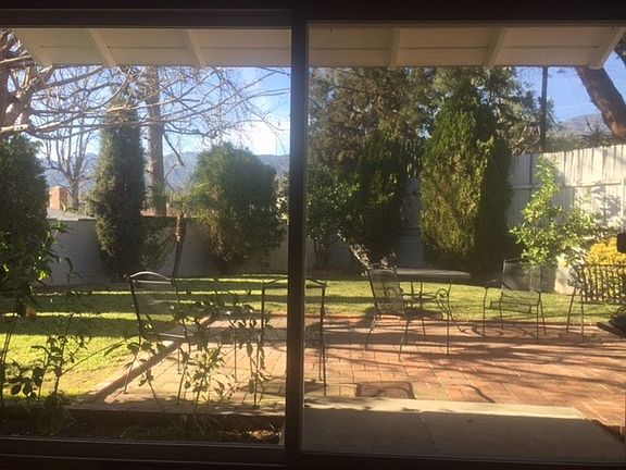 Backyard thru Den/3rd Bdrom