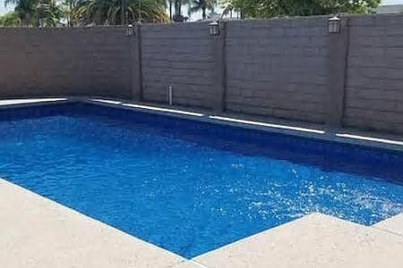 Spacious backyard with private swimming pool