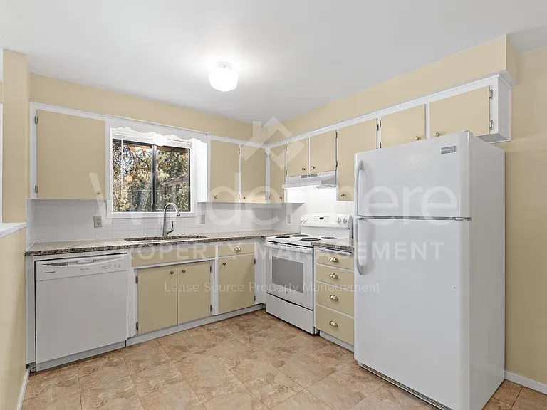 7805 E Upriver Dr — Photo 2