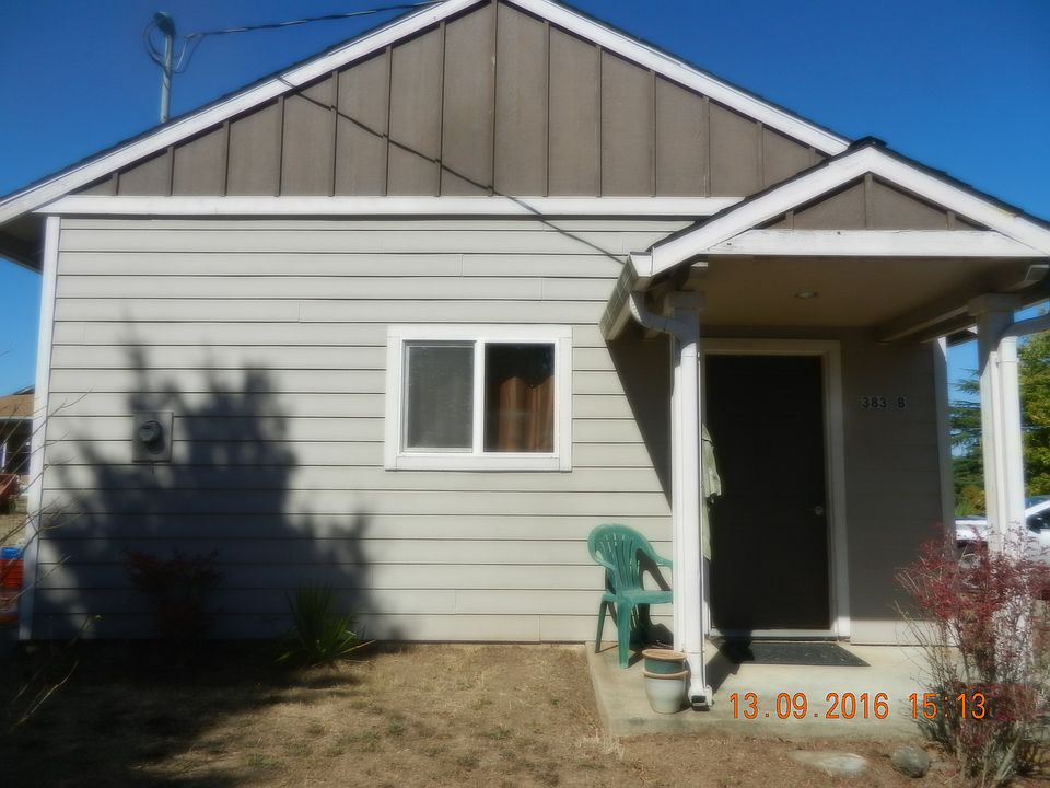 cottage sit's upon a hill