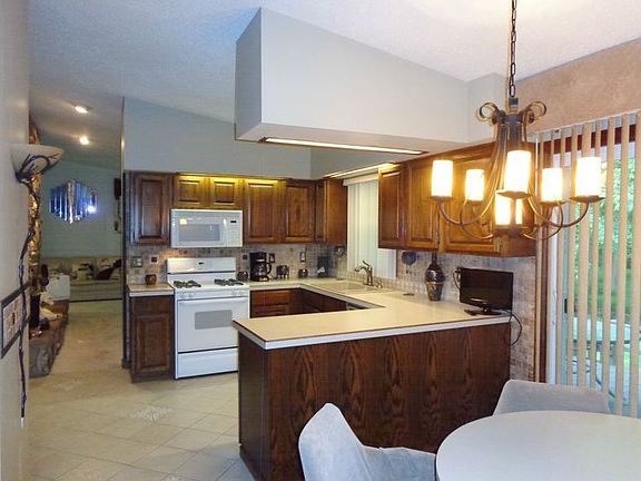 Kitchen appliances are included. Sliding glass door to the decks.