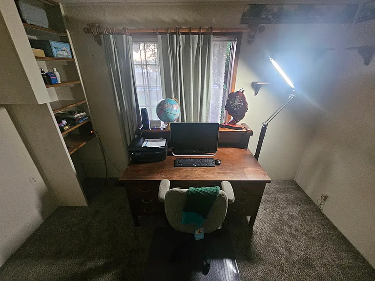 Office with large desk room is 7ft x 10.5 ft