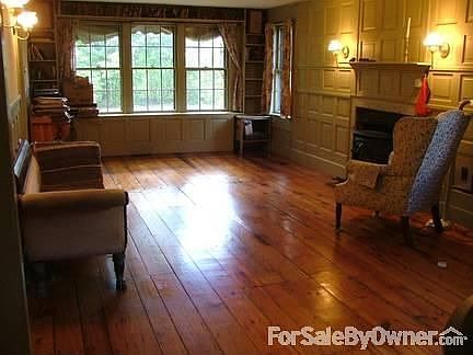 Living Room
						:
						Raised paneling, fireplace.