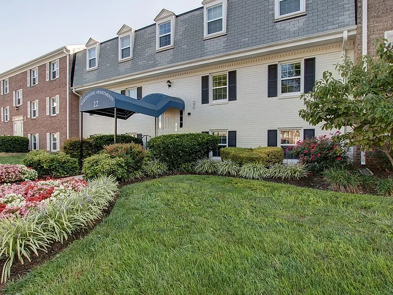 Another view of the entrance to leasing office and landscape