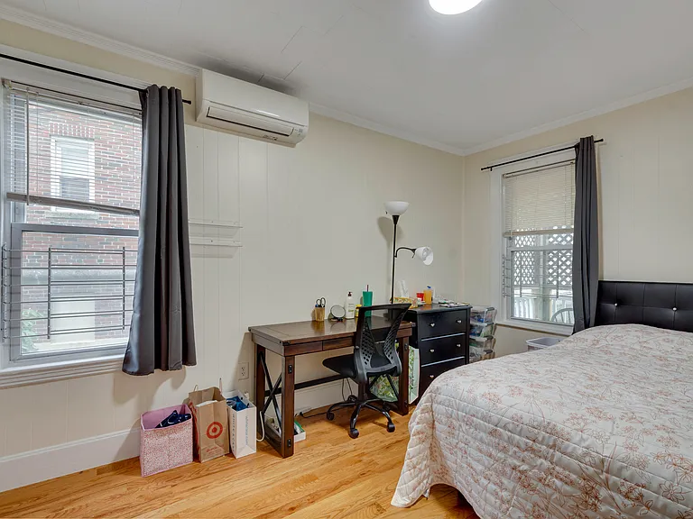 Rear left bedroom. Contains walk in closet with windows.