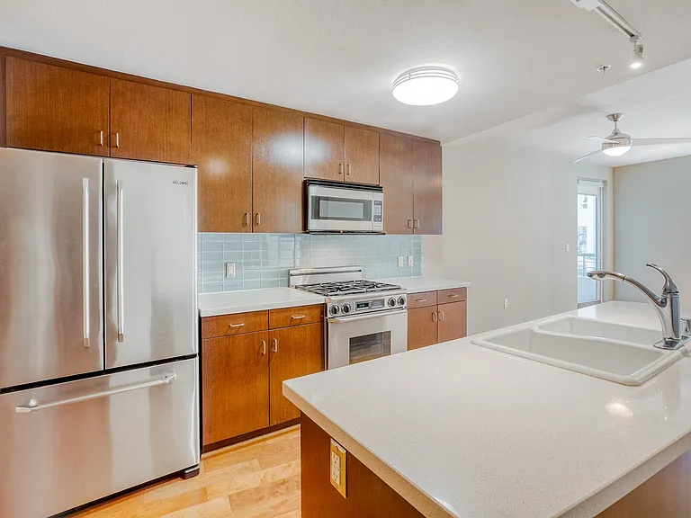 Gourmet kitchens with stainless steel appliances in our townhomes