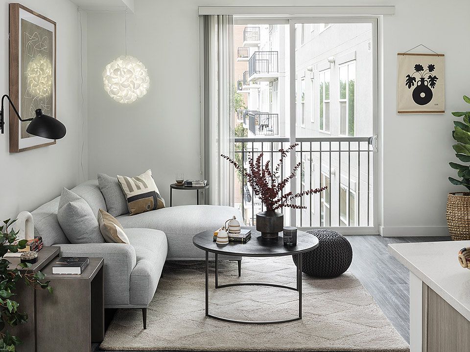 Apartment Living Room with wood floors.