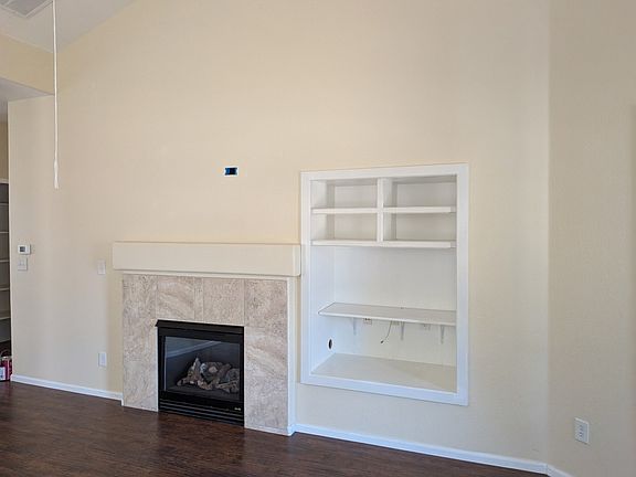 Living Room with Fireplace and built in