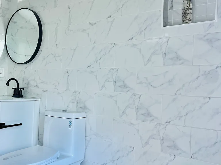 Fully tiled floor to ceiling bathroom and walk-in shower