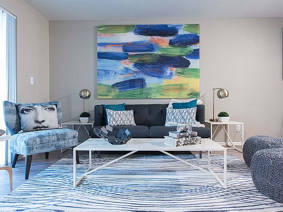 Apartment Living Room with wood floors.