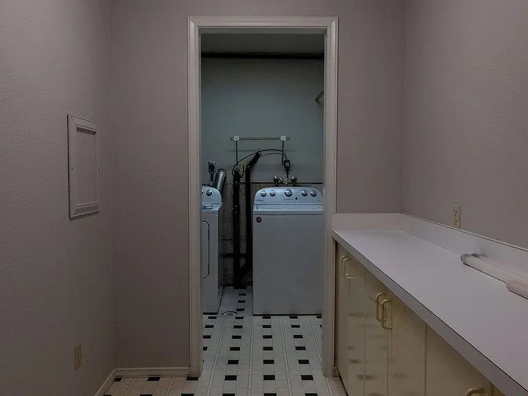 Hall to laundry room in basement