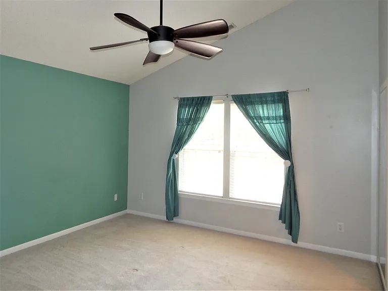 This bedroom has been painted white.
