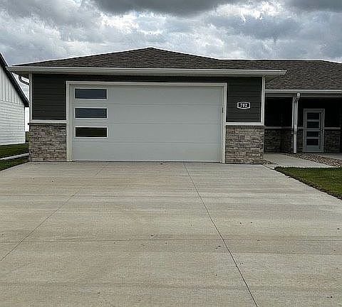 2-car garage, concrete drive