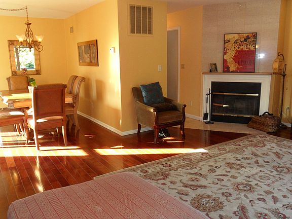 LOTS OF LIGHT STREAMING INTO THIS BEAUTIFUL LIVING RM/DINING RM COMBO