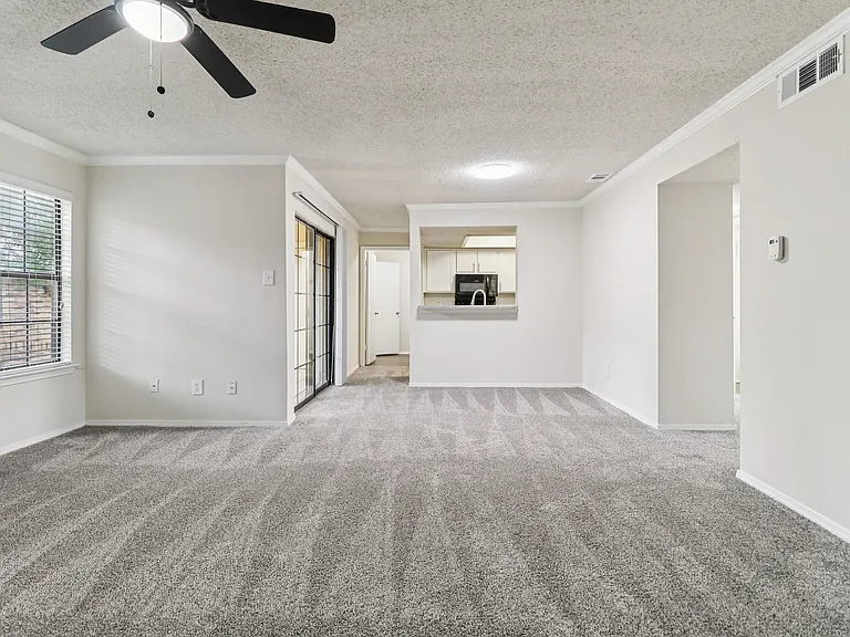 B2 Livingroom to patio. bar. utility room