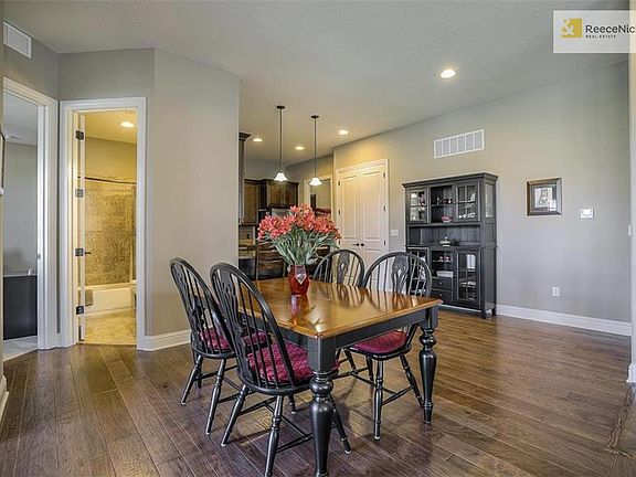 Dining area with hardood floor.