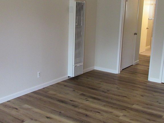 New laminate wood flooring and new wall heater