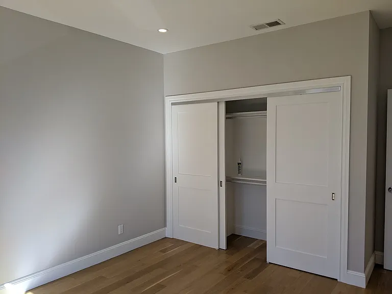 large triple closet in front bedroom